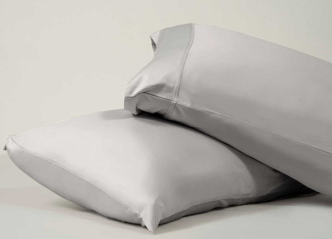 Active Comfort Pillowcases shown in Silver Cloud on pillows #choose-your-color_silver-cloud