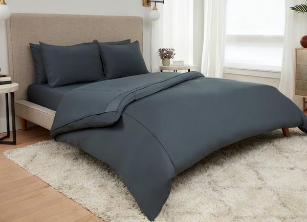 Forest Green sheet set shown on bed