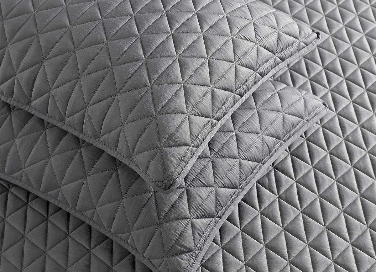 Arctic Diamond Coverlet and Shams in Charcoal in bedroom environment. #choose-your-color_charcaoal