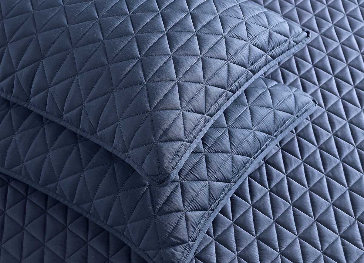 Arctic Diamond Coverlet and Shams shown in Navy. #choose-your-color_navy