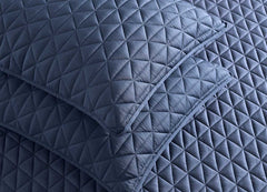 Arctic Diamond Coverlet and Shams shown in Navy. #choose-your-color_navy