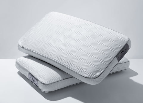 Lifestlye image of two Infinite Zen Performance Pillows stacked