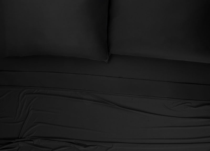 Nightfall Sheets and Pillowcases on a bed shown in Black Eclipse #choose-your-color_black-eclipse