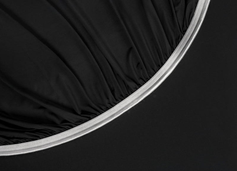 Detail image of athletic-grade elastic on Nightfall fitted sheet #choose-your-color_black-eclipse