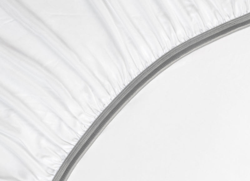 Detail image of athletic-grade elastic on Nightfall fitted sheet #choose-your-color_cloud-white