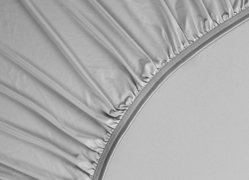 Detail image of athletic-grade elastic on Nightfall fitted sheet #choose-your-color_silver-dusk