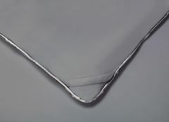 Graphite Original Performance All Season Comforter detail shot showing the duvet cover ties.