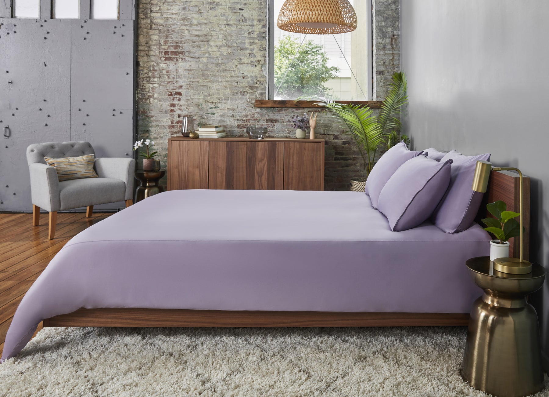 Lavender sheet set shown on bed in bedroom environment. #choose-your-color_lavender