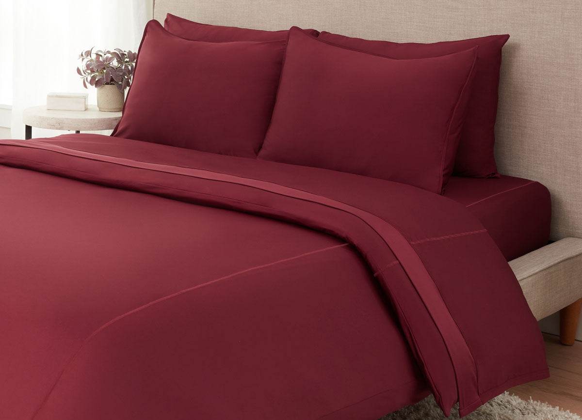 Garnet Sheet Set on bed in room #choose-your-color_garnet