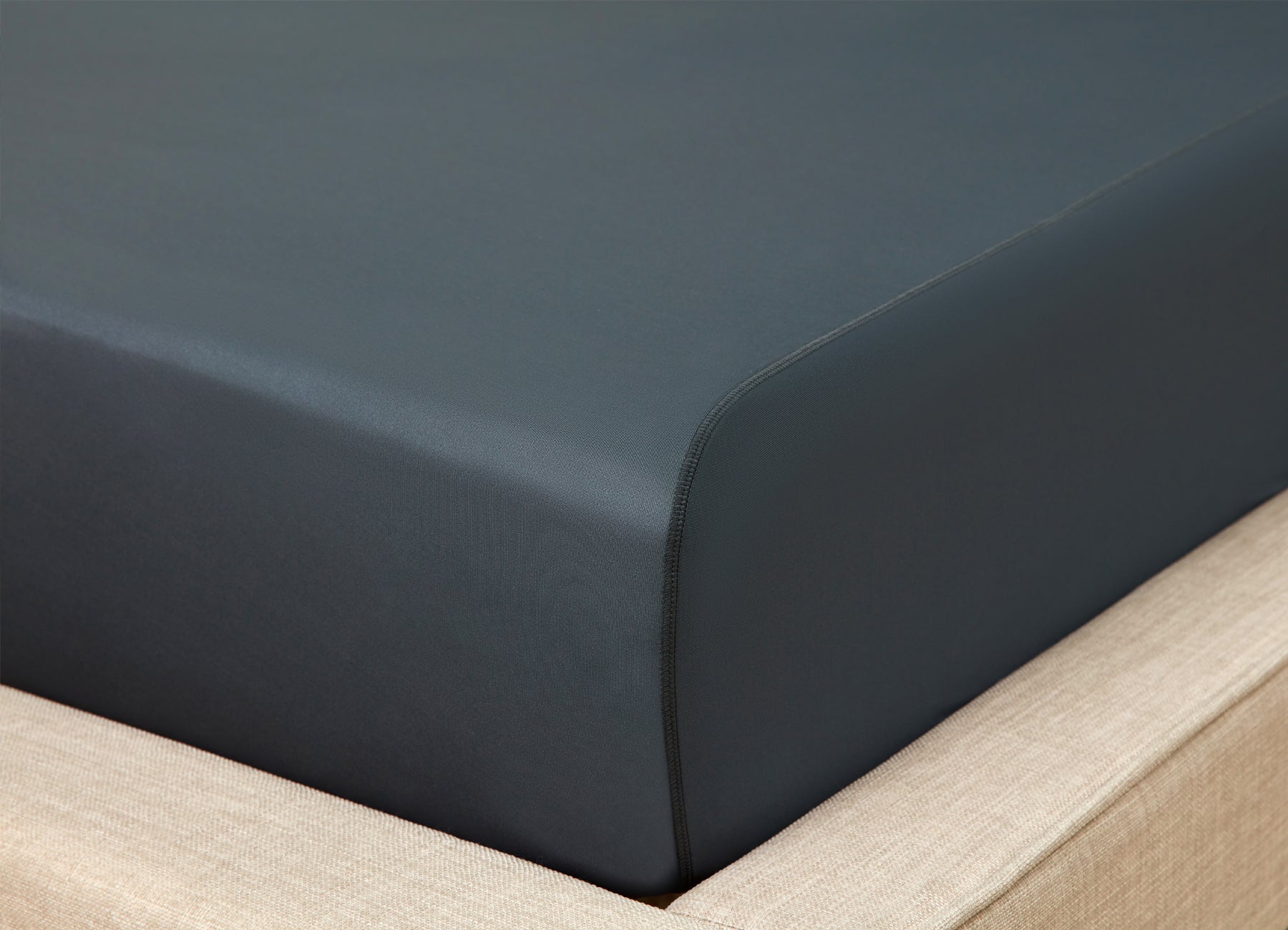 Original Performance Fitted Sheet shown on bed in forest green