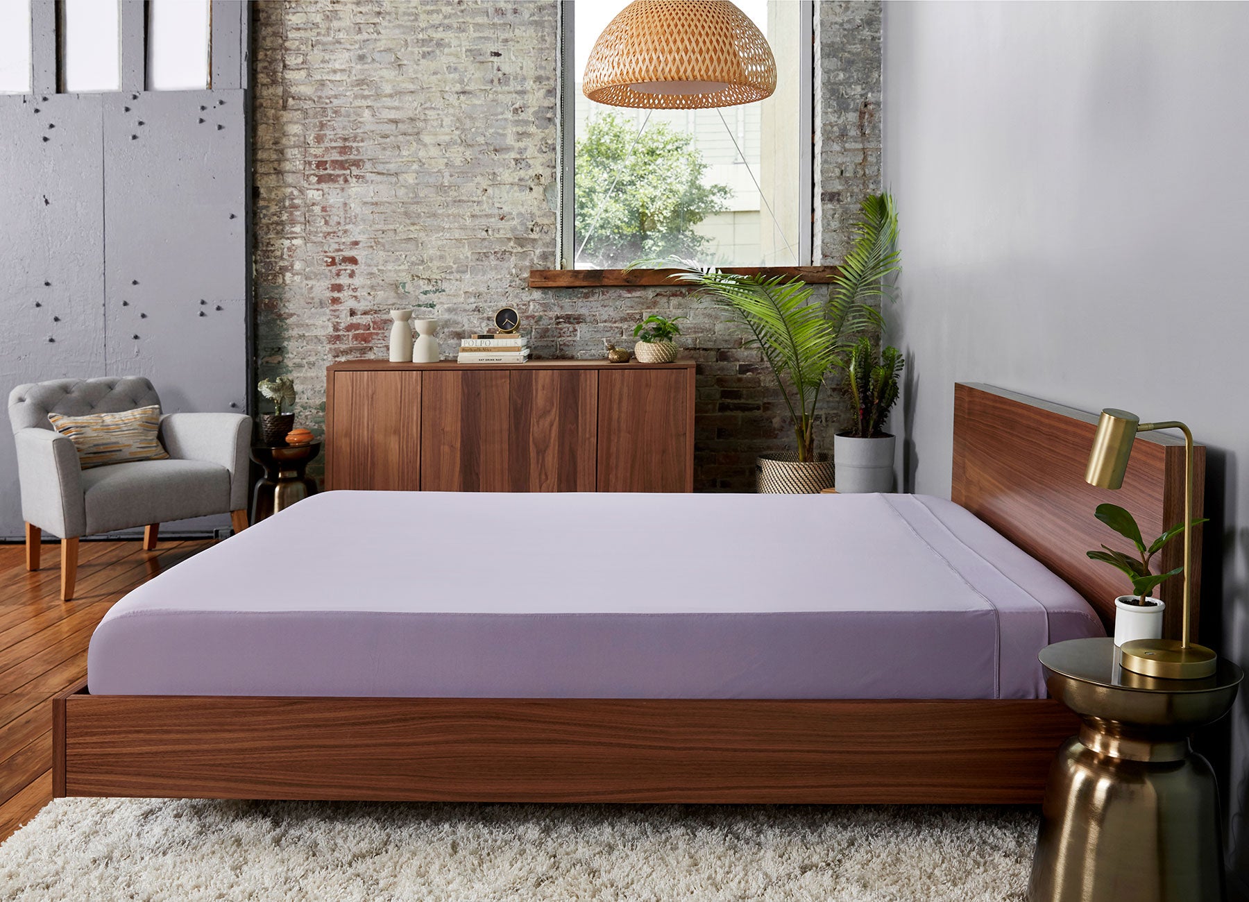 Lavender sheet set shown on bed in bedroom environment. #choose-your-color_lavender