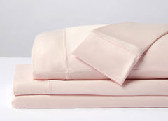 Original Performance Sheet Sets shown in stack in Blush Pink. #choose-your-color_blush-pink