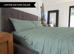 Serene Green sheet set shown on bed in bedroom environment. #choose-your-color_serene-green