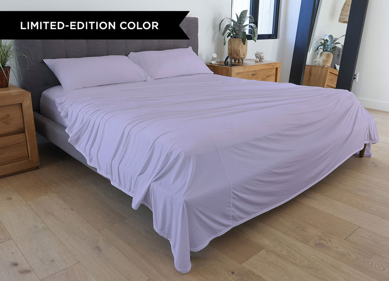Silver Lilac sheet set shown on bed in bedroom environment. #choose-your-color_silver-lilac
