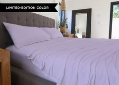 Silver Lilac sheet set shown on bed in bedroom environment. #choose-your-color_silver-lilac
