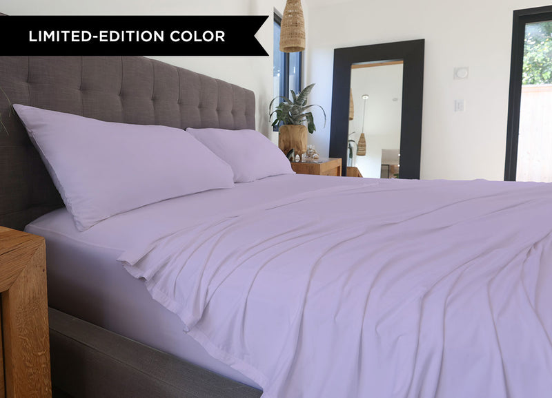 Silver Lilac sheet set shown on bed in bedroom environment. #choose-your-color_silver-lilac