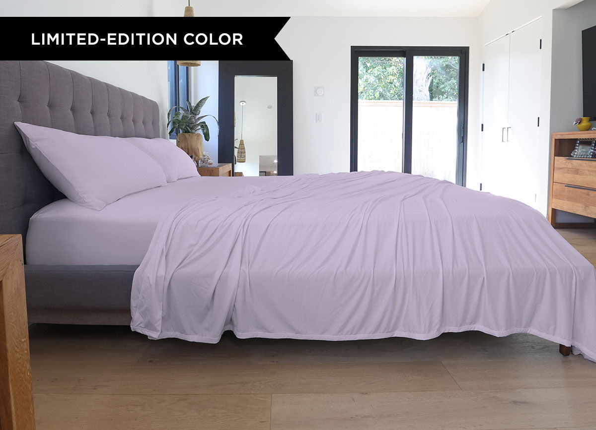 Silver Lilac sheet set shown on bed in bedroom environment. #choose-your-color_silver-lilac