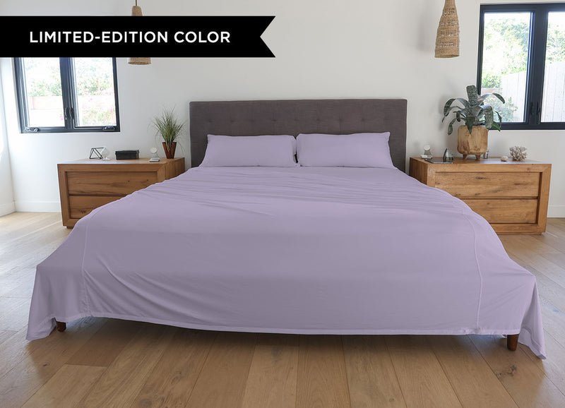 Silver Lilac sheet set shown on bed in bedroom environment. #choose-your-color_silver-lilac
