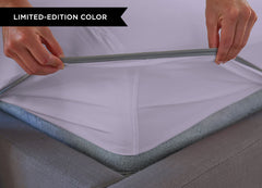 Silver Lilac sheet set close up of corner with athletic-grade elastic on bed. #choose-your-color_silver-lilac