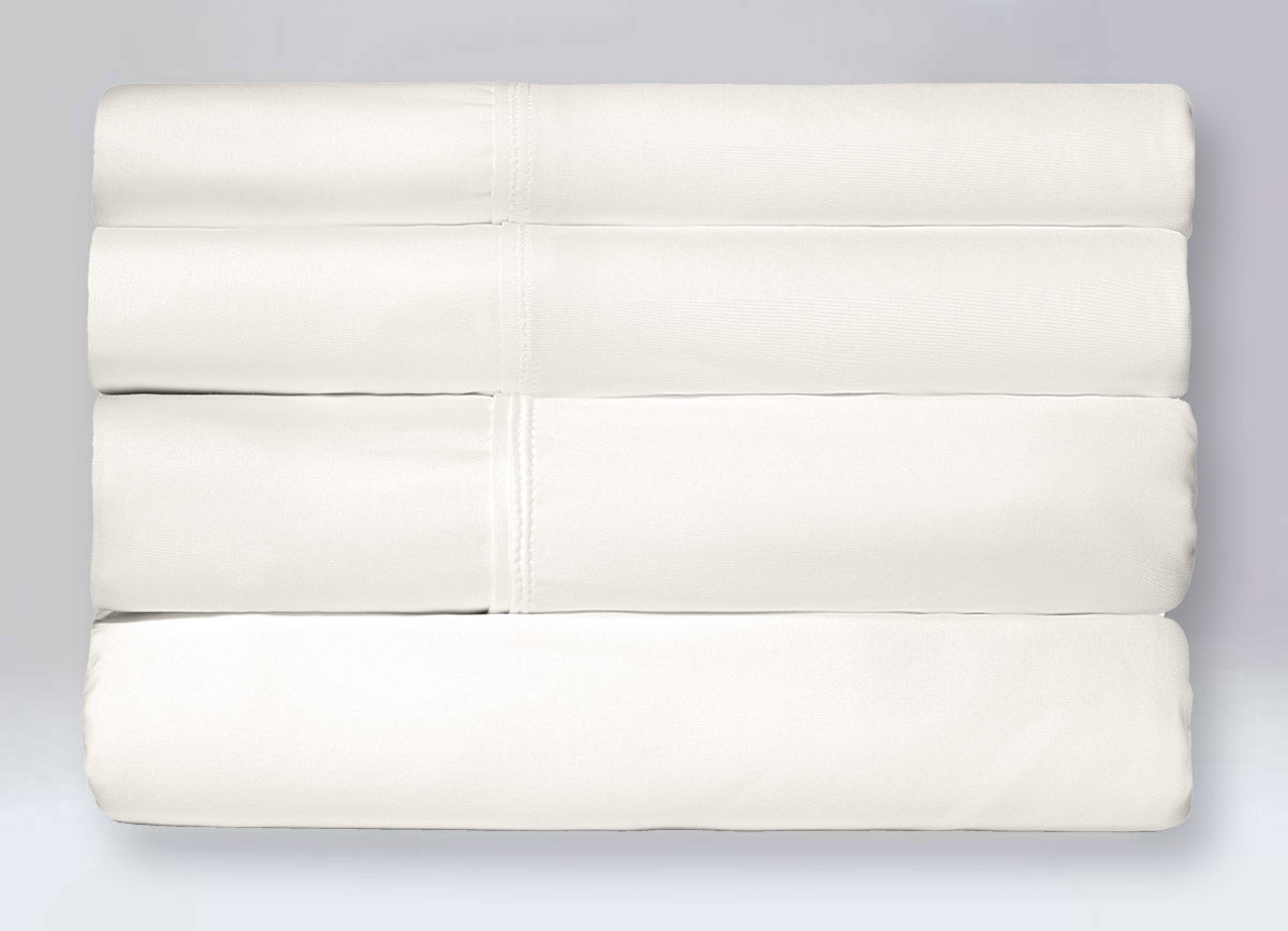 Active Comfort Sheet Set shown in stack #choose-your-color_parchment