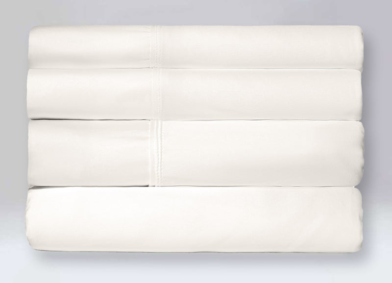 Active Comfort Sheet Set shown in stack #choose-your-color_parchment