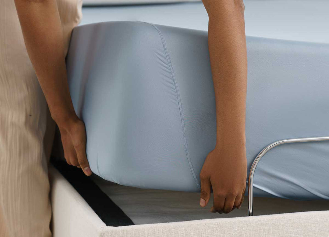Corner detail image of Active Comfort Sheet Set shown on bed #choose-your-color_blue-sky