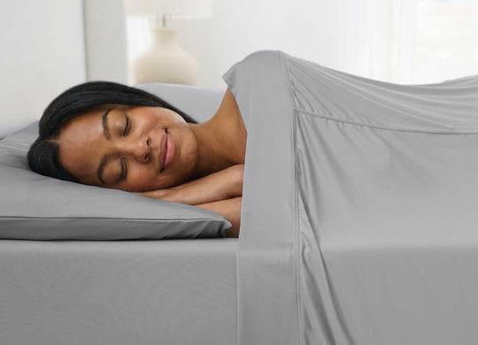 Active Comfort Sheet Set shown on bed with model #choose-your-color_pewter