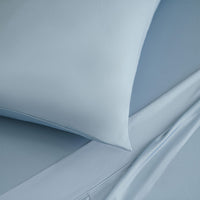 Detail shot of Active Comfort Sheet Set shown on bed #choose-your-color_blue-sky