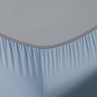 Detail shot of Active Comfort Sheet Set shown on bed #choose-your-color_blue-sky