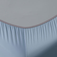 Detail shot of Active Comfort Sheet Set shown on bed #choose-your-color_blue-sky