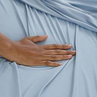 Detail shot of Active Comfort Sheet Set shown on bed #choose-your-color_blue-sky