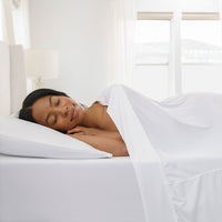 Active Comfort Sheet Set shown on bed with model #choose-your-color_bright-white