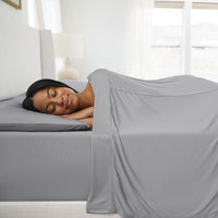 Active Comfort Sheet Set shown on bed with model #choose-your-color_pewter