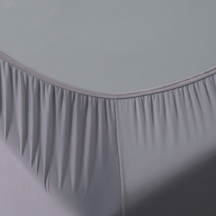 Corner detail image of Active Comfort Sheet Set shown on bed #choose-your-color_pewter