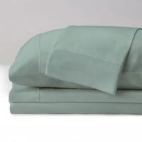 Lifestyle of ARCTIC AIRE•MAX Sheet Set stack shown in Aloe #choose-your-color_aloe