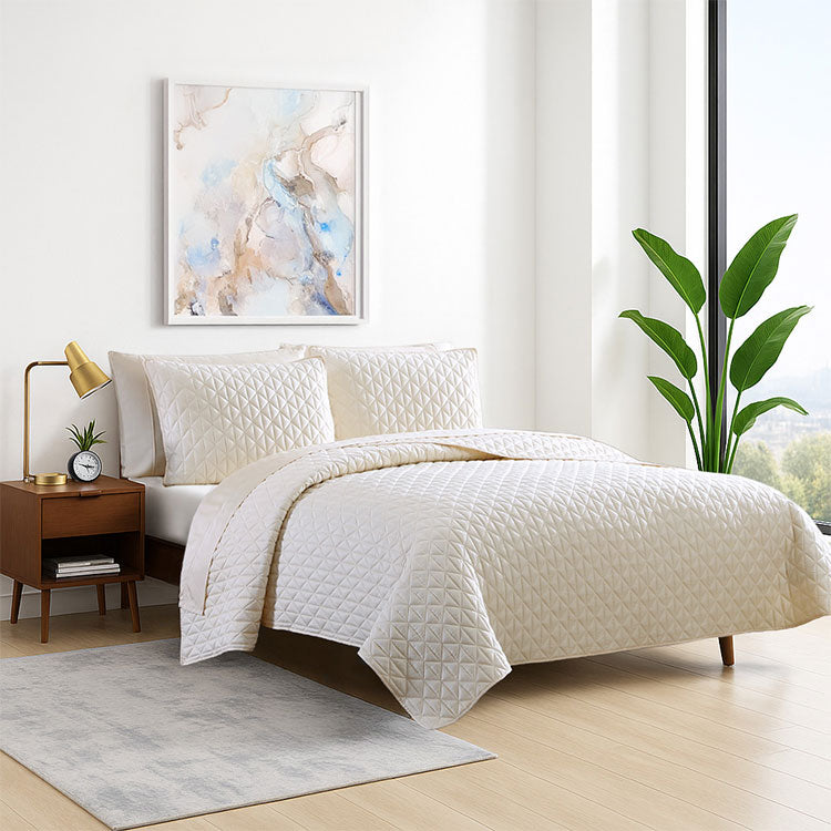 Arctic Diamond Coverlet and Shams in bedroom shown in Ivory. #choose-your-color_ivory