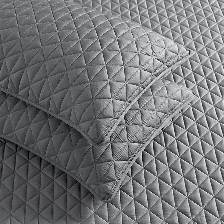 Arctic Diamond Coverlet and Shams in Charcoal in bedroom environment. #choose-your-color_charcaoal