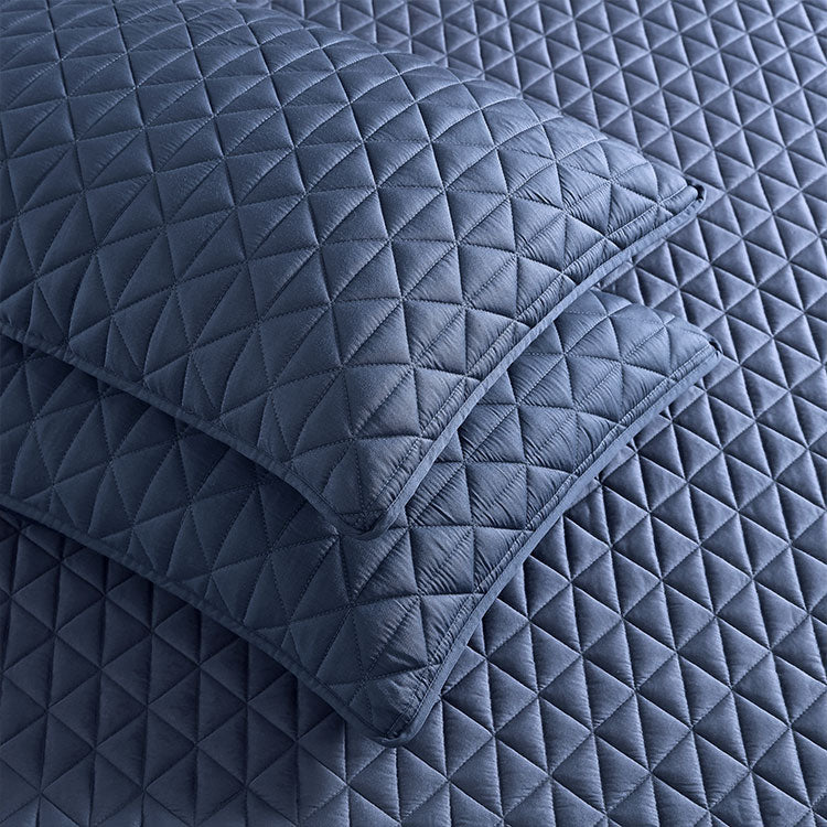 Arctic Diamond Coverlet and Shams shown in Navy. #choose-your-color_navy