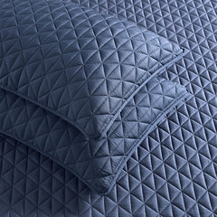 Arctic Diamond Coverlet and Shams shown in Navy. #choose-your-color_navy