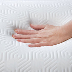 Image showing hand pressing on Infinite Zen Performance Pillow