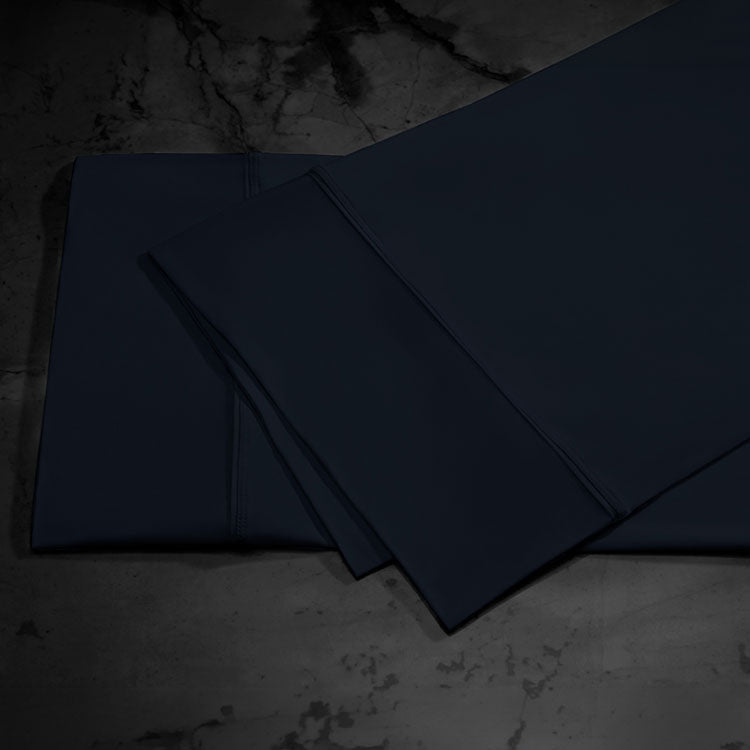 midnight label pillowcase stack shown in nightfall #choose-your-color_nightfall
