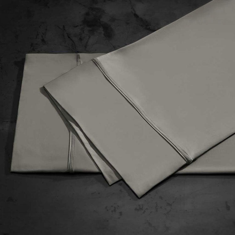 midnight label pillowcase stack shown in stone #choose-your-color_stone