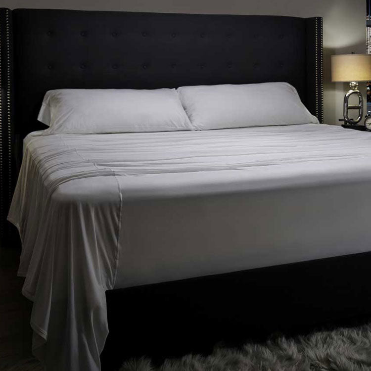 Midnight Label Sheet Set on bed #choose-your-color_porcelain