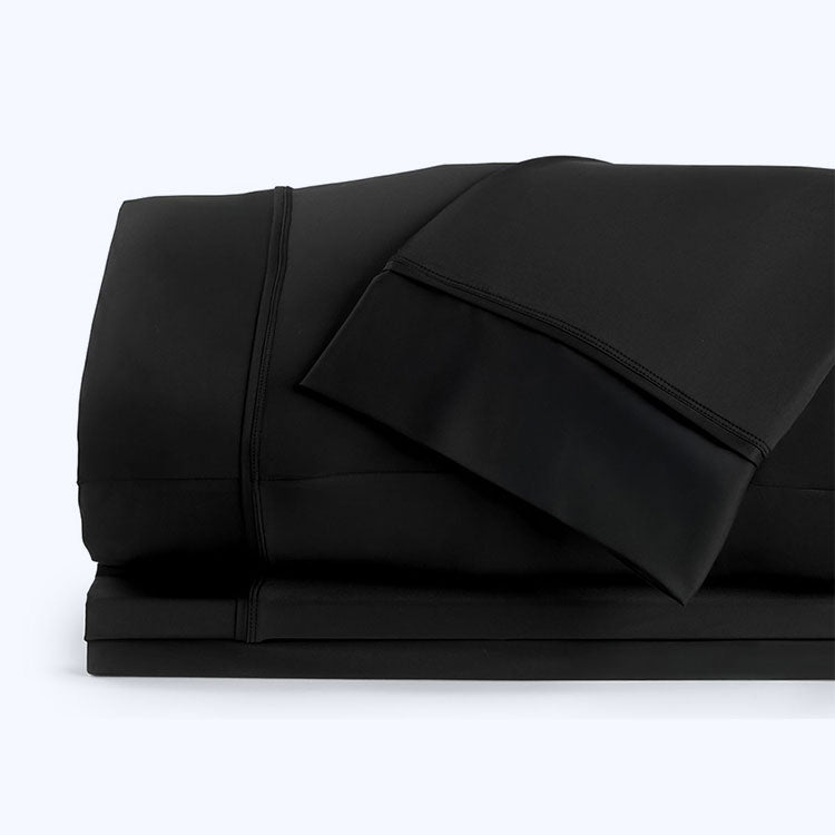 Nightfall Sheet Sets shown in stack #choose-your-color_black-eclipse