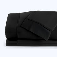 Nightfall Sheet Sets shown in stack #choose-your-color_black-eclipse