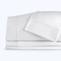 Nightfall Sheet Sets shown in stack #choose-your-color_cloud-white