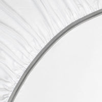 Detail image of athletic-grade elastic on Nightfall fitted sheet #choose-your-color_cloud-white