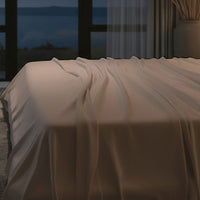 Bed has Nightfall Sheet Sets in Sand Dune color.#choose-your-color_sand-dune
