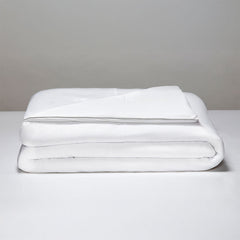 Original Performance All Season Comforter shown folded #choose-your-color_bright-white