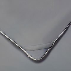 Graphite Original Performance All Season Comforter detail shot showing the duvet cover ties. #choose-your-color_graphite